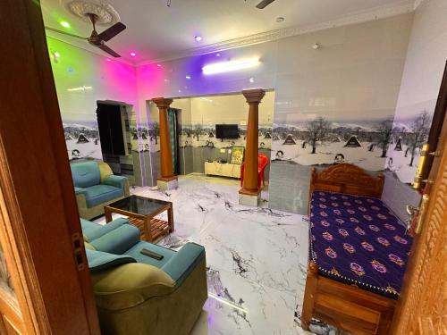 a living room with a floor covered in marble at Jacobs Cottage KG-G1 in Thiruchendur