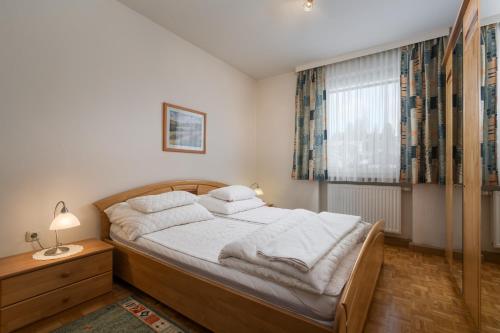 Ένα ή περισσότερα κρεβάτια σε δωμάτιο στο Appartement Zentral