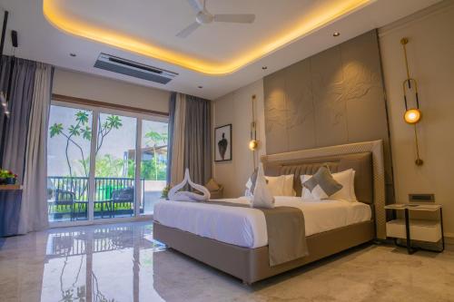 Ένα ή περισσότερα κρεβάτια σε δωμάτιο στο Amartara luxury hotel and resorts, Abu Road