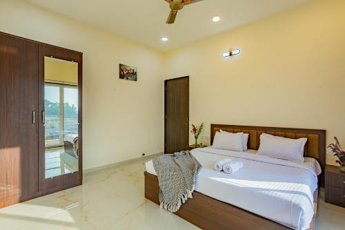 Ένα ή περισσότερα κρεβάτια σε δωμάτιο στο Paradise