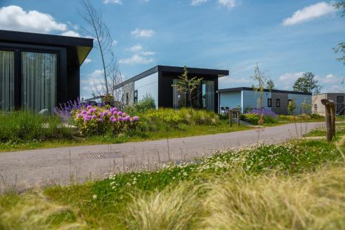 Κήπος έξω από το Vakantiepark De Wiedense Meren