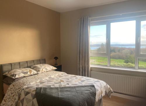 Giường trong phòng chung tại Harkins Haven