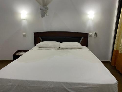 Кровать или кровати в номере White Villa