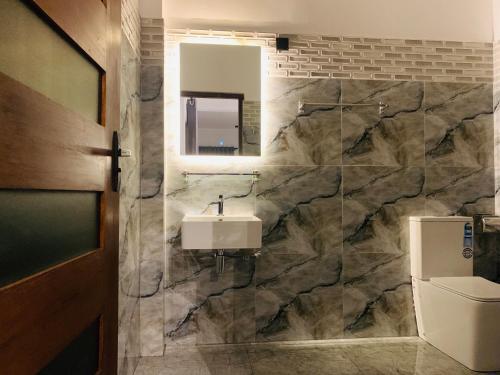 Koupelna v ubytování Dasis villa