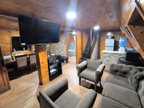 Una cocina o cocineta en Cabañas bosque de la bruja