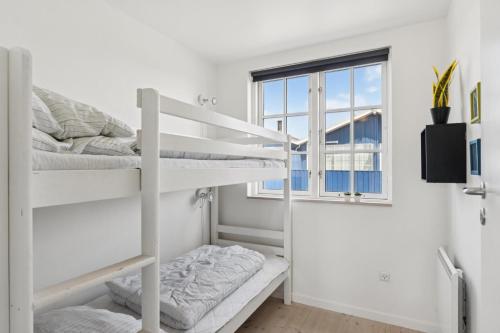 Giường trong phòng chung tại Feriehus 3005