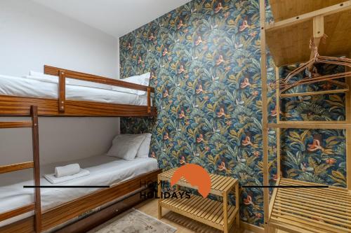 Ένα ή περισσότερα κρεβάτια σε δωμάτιο στο #056 Old Post Office by Home Holidays