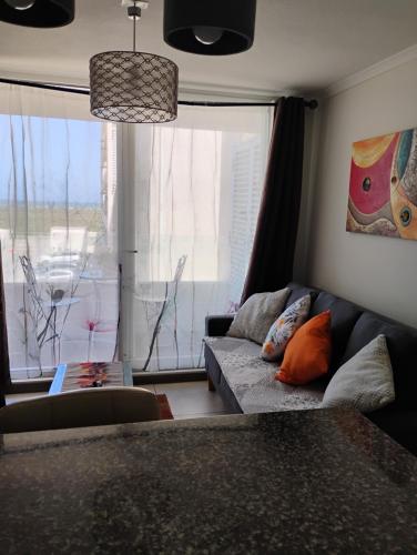 Posezení v ubytování DEPARTAMENTO AVENIDA PACIFICO. SECTOR PUERTA DEL MAR