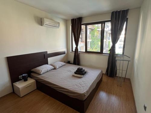 En eller flere senge i et værelse på Camping Gradina Sunny Bay Appartment