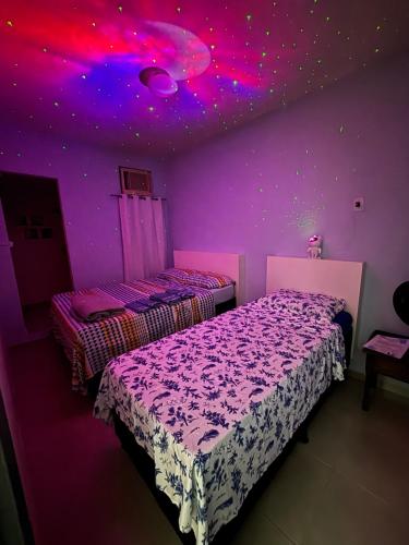 Ένα ή περισσότερα κρεβάτια σε δωμάτιο στο Refúgio Pérola Capixaba