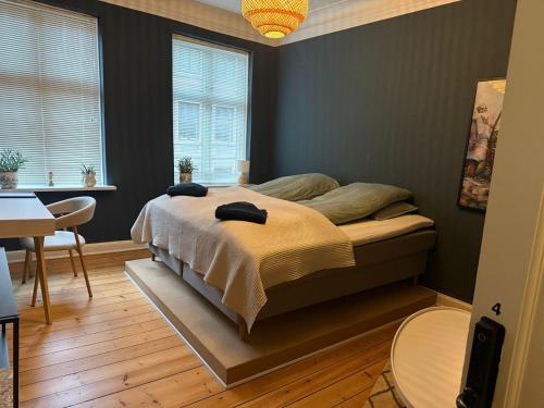 Postel nebo postele na pokoji v ubytování Green Brook - Blue Suite