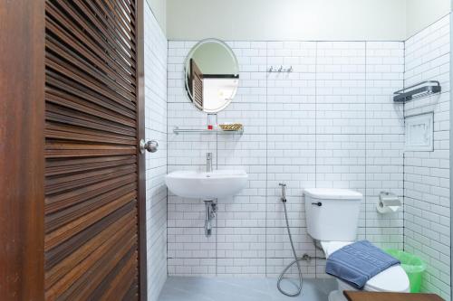 Koupelna v ubytování Amorn Mansion