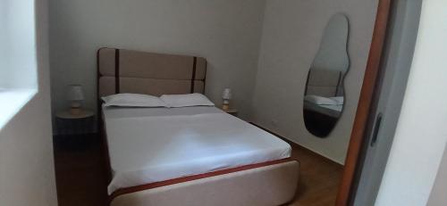 Ένα ή περισσότερα κρεβάτια σε δωμάτιο στο Cozy Apartment