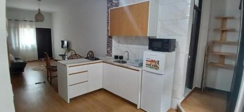 Η κουζίνα ή μικρή κουζίνα στο Cozy Apartment