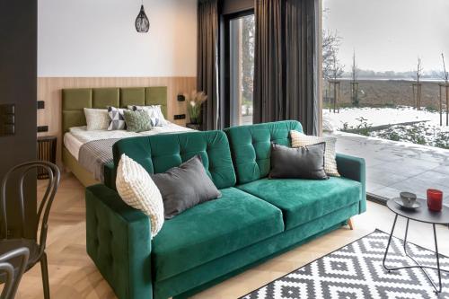 Postel nebo postele na pokoji v ubytování Apartamenty RIO Oława