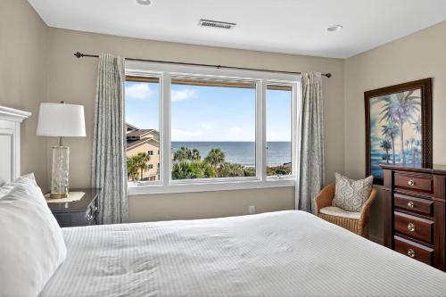 Ένα ή περισσότερα κρεβάτια σε δωμάτιο στο SG8C: 8C Seagrove Villa