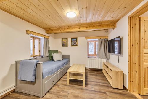 Postel nebo postele na pokoji v ubytování Chalupa Javořinka