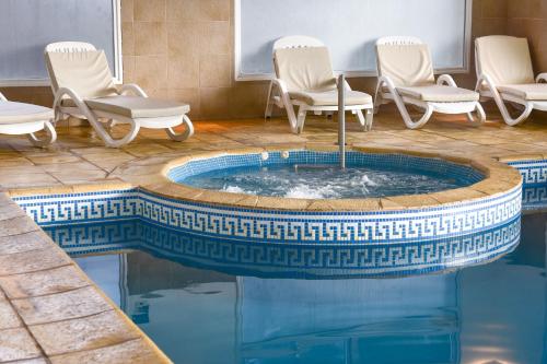 Πισίνα στο ή κοντά στο Huinid Pioneros Hotel & Aparts