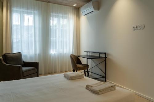 Posezení v ubytování ORM - Santa Teresa Apartments