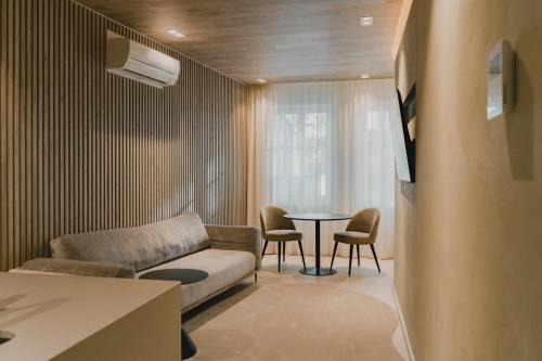 Posezení v ubytování ORM - Santa Teresa Apartments