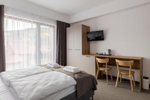 Ένα ή περισσότερα κρεβάτια σε δωμάτιο στο Casa Piattino