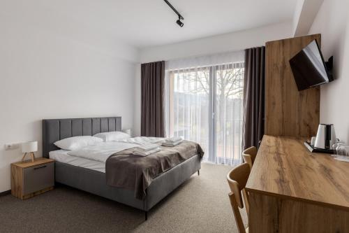 Ένα ή περισσότερα κρεβάτια σε δωμάτιο στο Casa Piattino