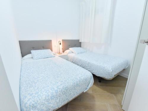 Ένα ή περισσότερα κρεβάτια σε δωμάτιο στο Algaba Huelva alto