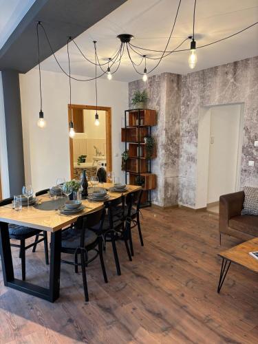 a large dining room with a table and chairs at Ferienwohnung Strizi in Ruhpolding