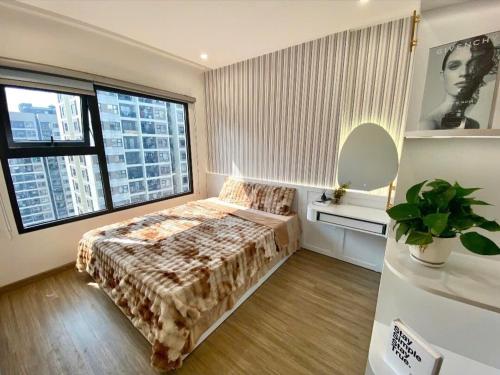 Ένα ή περισσότερα κρεβάτια σε δωμάτιο στο Modern 1BR with Balcony Park View Hanoi