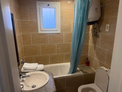 Ένα μπάνιο στο Sunset Pearl APARTMENTS