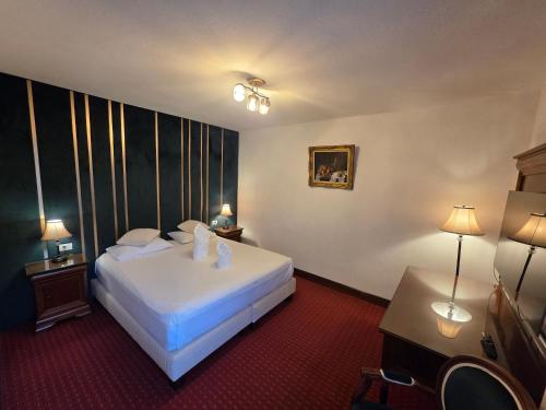 Postel nebo postele na pokoji v ubytování Hotel Select