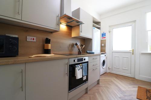 Køkken eller tekøkken på Signature - Oak House