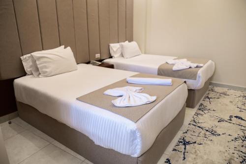 Postel nebo postele na pokoji v ubytování Heart Scarab Pyramids View