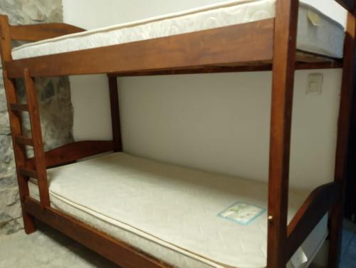 a couple of bunk beds in a room at Relax by the sea in Piriápolis