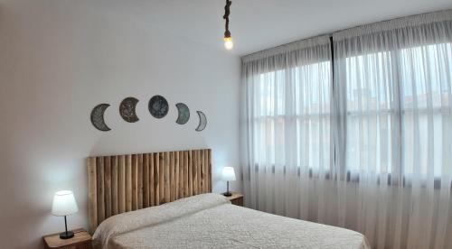 Postel nebo postele na pokoji v ubytování Casa Vacacional Entre Mar y Picos