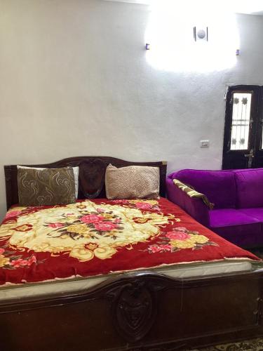 Postel nebo postele na pokoji v ubytování عجلون صخره