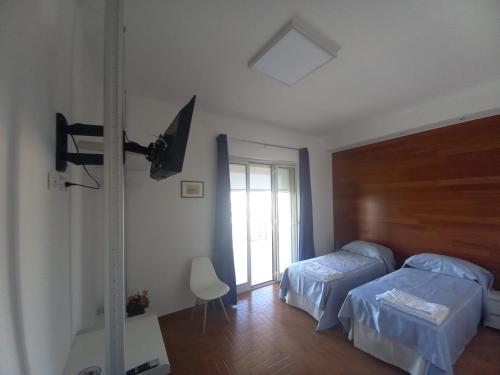 سرير أو أسرّة في غرفة في L'Attico di Matilde