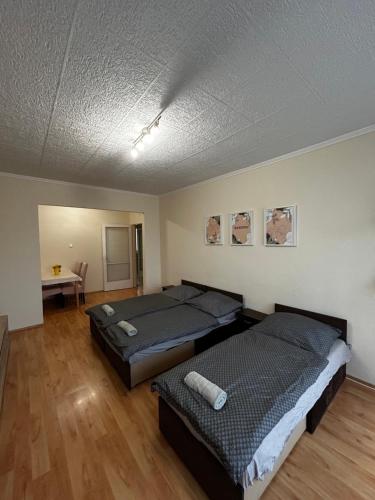 Ένα ή περισσότερα κρεβάτια σε δωμάτιο στο Backstage