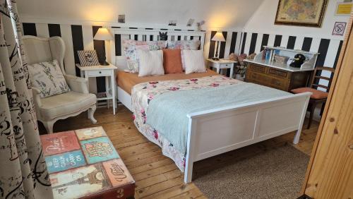 Postel nebo postele na pokoji v ubytování Villa Kunterbunt