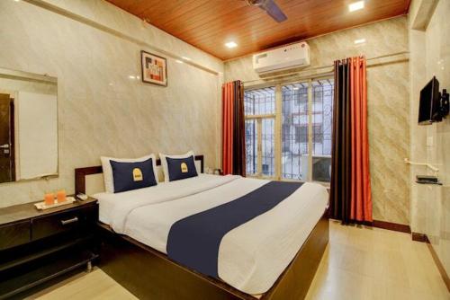 Ένα ή περισσότερα κρεβάτια σε δωμάτιο στο Hotel Horizon Lonavala
