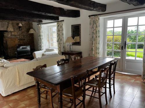 Postel nebo postele na pokoji v ubytování Gîtes du Gohic