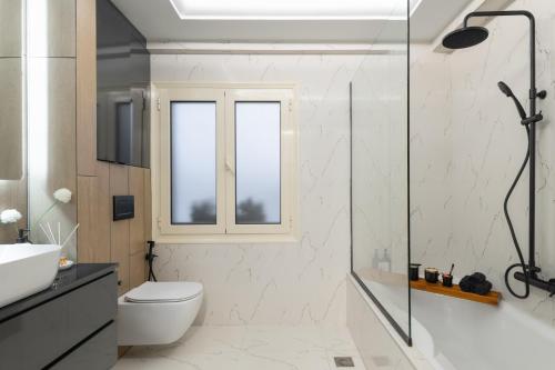 Et badeværelse på Elysian Residences Heraklion