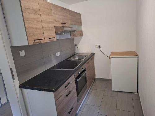 Kuchyň nebo kuchyňský kout v ubytování Zwei separate Zimmer im 1 OG Ideal für Montüeren oder Studenten WG