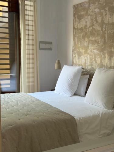 Postel nebo postele na pokoji v ubytování Hotel Los Patios - Parque Natural