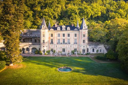 an aerial view of a large house with a yard at Château de Perreux, The Originals Collection in Amboise