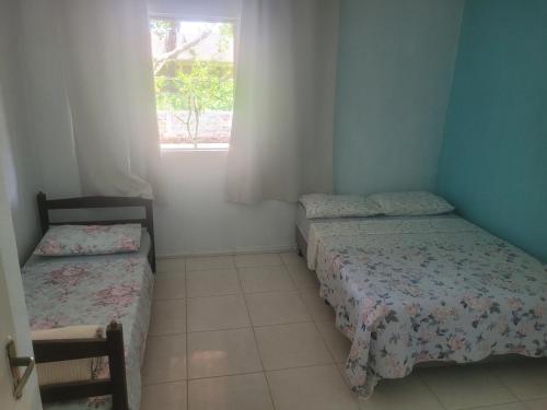 Ένα ή περισσότερα κρεβάτια σε δωμάτιο στο Beach house