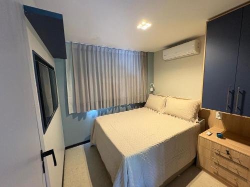 Giường trong phòng chung tại Casa em Praia do Forte