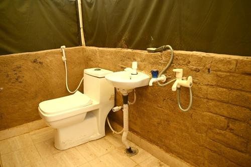 Koupelna v ubytování Kala kutir Tent & farm stay