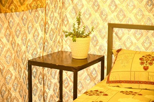 Postel nebo postele na pokoji v ubytování Kala kutir Tent & farm stay