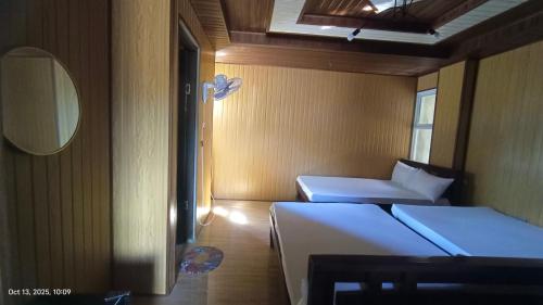 Ένα ή περισσότερα κρεβάτια σε δωμάτιο στο kiyomi's Inn